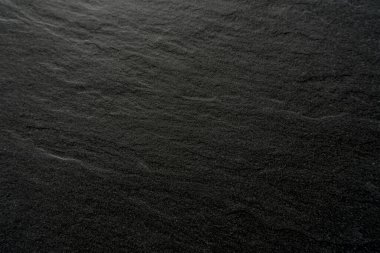 Dokuya sahip siyah beton arkaplan