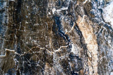 Farklı renklerin, soyut desenlerin karışımı, mermerleri taklit eder.