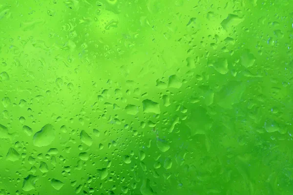 Abstract background with water drops on green background