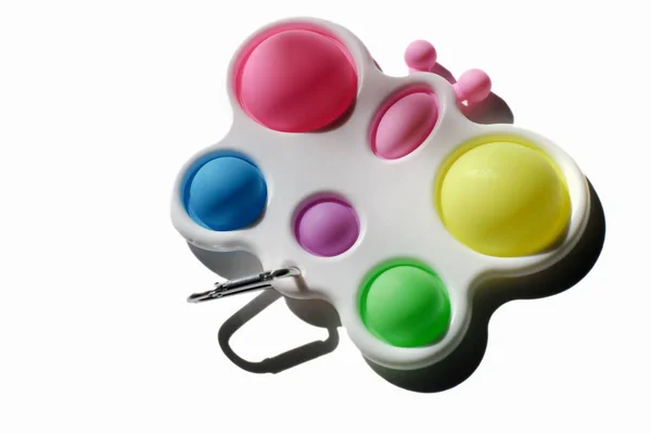 Jednoduché Dimple silikonové senzorické antistresové hračky Fidget. módní barevné hry izolované na bílém pozadí. uklidňující pomůcky, odlupování stresu dospělých, bublinková hračka. — Stock fotografie