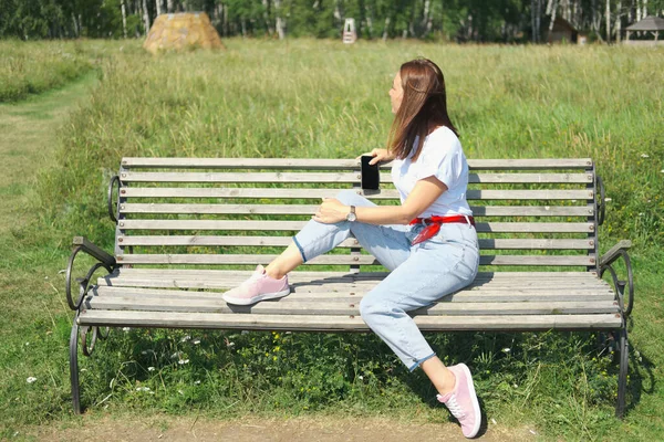 Young Beautiful Woman Sitting Bench Enjoying Pleasant Weather Side View — Stock Photo, Image