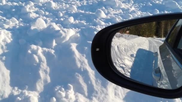 Car Driving Winter Road His Eyes Rearview Mirror Sunny Winter — Stock Video
