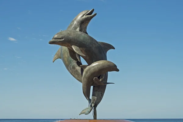 Sculpture of three dolphins — Stock Photo, Image