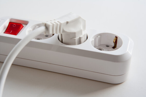 Electrical power strip with plug and red on-off button, electrical extension, power board