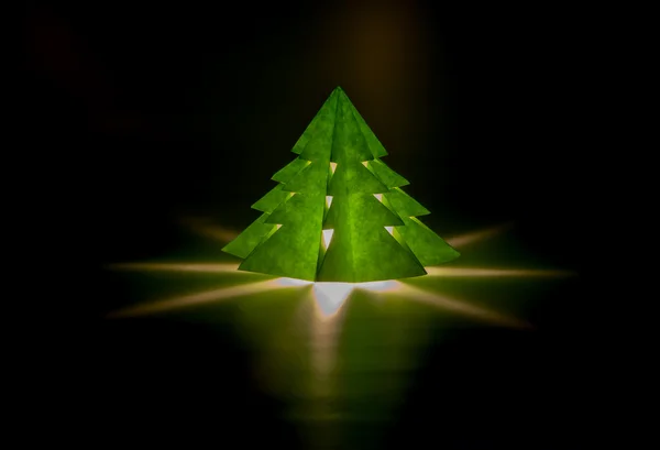 İçinde karanlık bir odada bir mum ile Noel ağacı şeklinde küçük fener