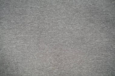 Arka plan koyu gri renkli kalın kumaştan yapılmıştır..