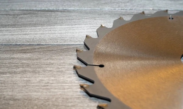 Metal disc from a circular saw close-up. Saw blade for wood and laminate.