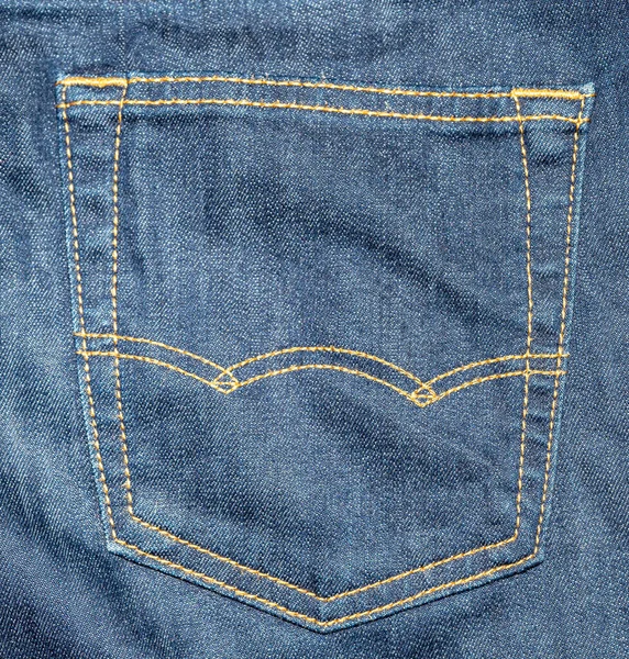 Tasca posteriore di jeans blu da vicino — Foto Stock