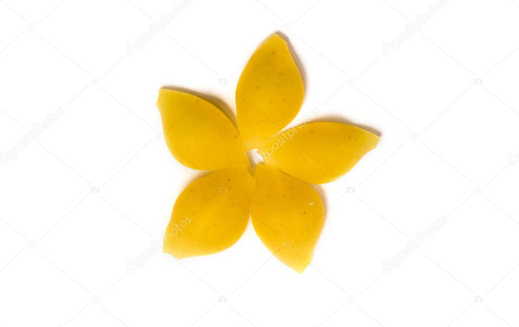 Flower shape made of raw Italian pasta isolated on white background.
