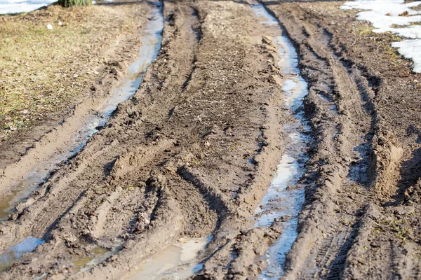 stock image Spring thaw in the villages, the roads are blurred with mud, the car will not pass