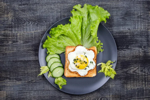 Healthy Restaurant breakfast with fry pan eggs with salad on white background top view