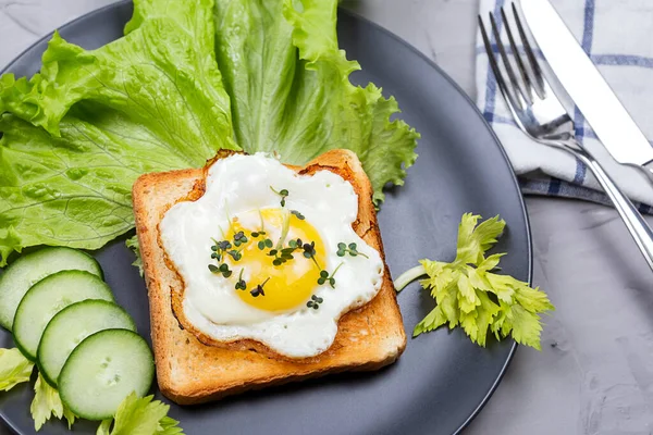 Healthy Restaurant breakfast with fry pan eggs with salad on white background top view