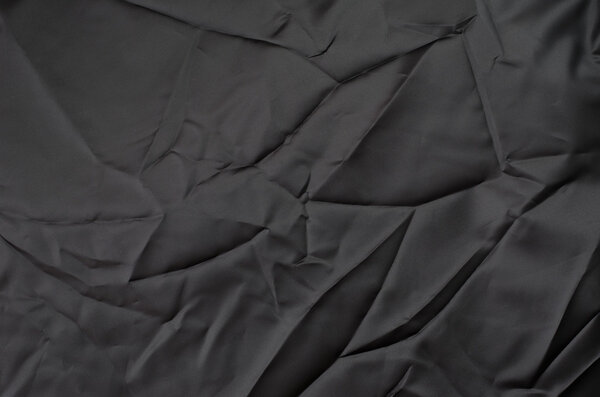 Crumpled black fabric texture