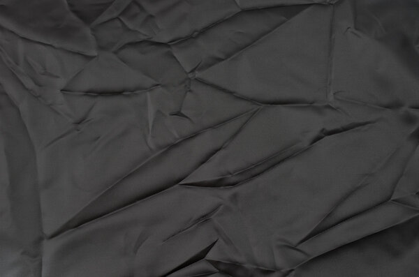 Crumpled black fabric texture