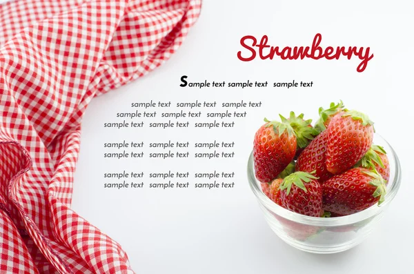 Strawberry in bowl and red napkin isolated on white with sample text — Stock Photo, Image