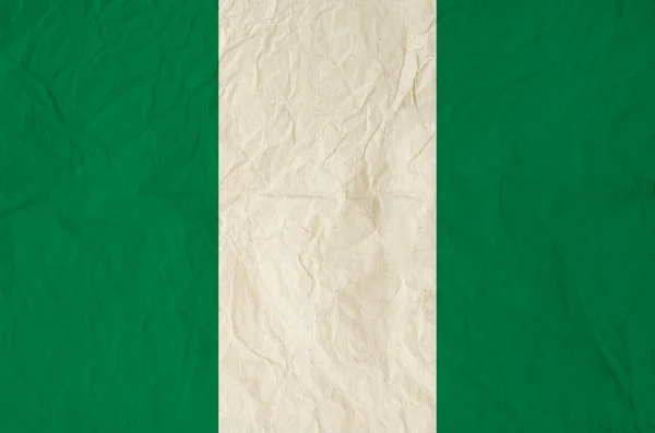 Flag of Nigeria with old vintage paper texture background — Stock Photo, Image