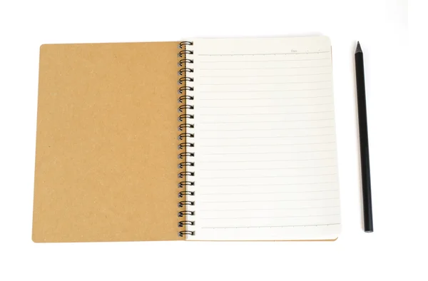 Notatnik z recyklingu papieru i ołówek czarny izolować na bezprzewodowy biały — Zdjęcie stockowe