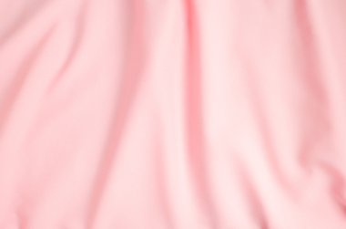 Buruşmuş pembe kumaş dokusu arkaplanı