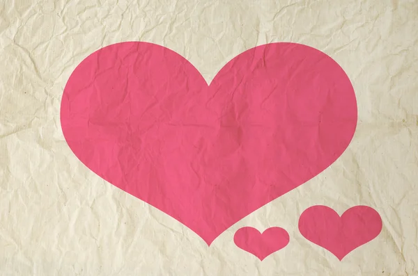 Heart shape on old paper background — Stock Photo, Image