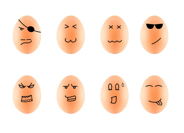 鸡蛋在纸箱上滑稽绘图面临分离对白色带剪辑 图库图片