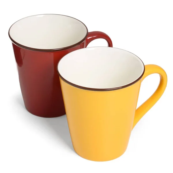 Due Tazze Ceramica Sfondo Bianco Tazza Vuota Rossa Gialla — Foto Stock