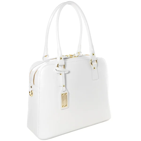 Kvinnliga vitt läderväska med guld prydnadssak isolerad på vit — Stockfoto