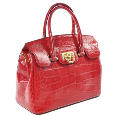 Sürüngen deri üzerinde beyaz arka plan izole kırmızı kadın deri çanta yapılmış