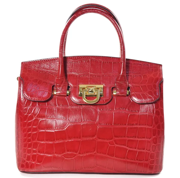 Sürüngen deri üzerinde beyaz izole kırmızı kadın deri çanta yapılmış