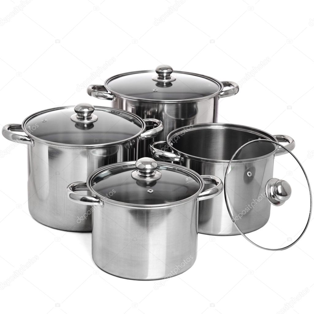 Set of 4 stainless pots with glass lids isolated on white