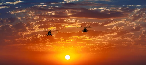 Mi-8 helicopters, warm sunset, celestial panorama — Stock Photo, Image