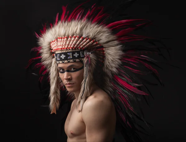 Indian strong man with traditional native american make up — Stock Photo, Image