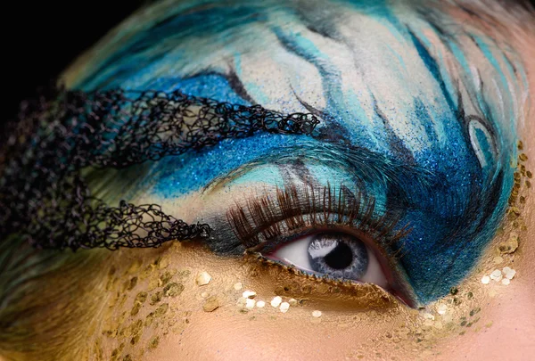 Young woman eye with fantasy make up — Stok fotoğraf