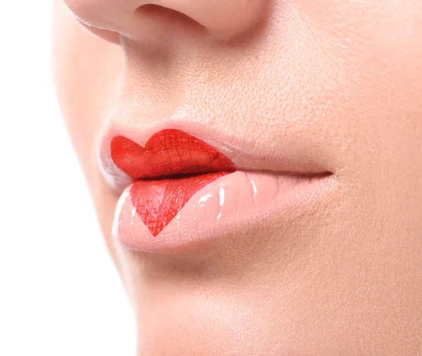 Lovely red make up at the heart shape on lips — Stock Photo, Image