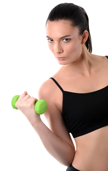 Porträt einer Fitness-Frau, die mit einer Hantel trainiert — Stockfoto