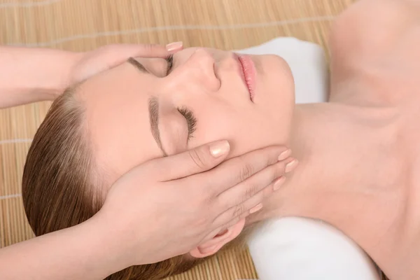 Beautiful young woman getting relaxing head massage. Top view — Stock Photo, Image