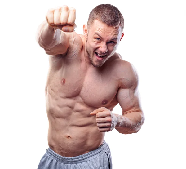 灰色の背景にトレーニング パンチを作る男性のボクサー — ストック写真