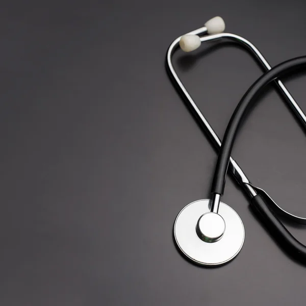 Stethoscope on gray background — Stock Photo, Image