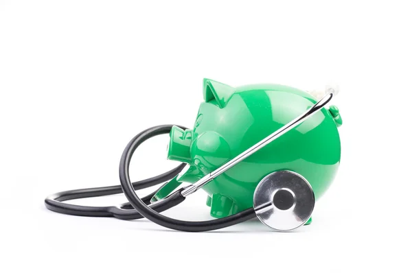 Piggy bank with stethoscope — Stock Photo, Image