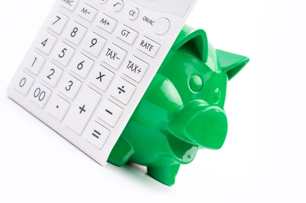 Piggy bank with calculator — Stock Photo, Image