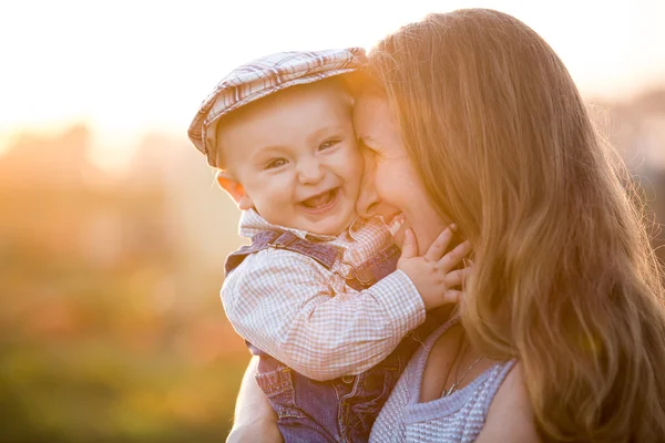 Mom son pumpkin — Stock Photo, Image