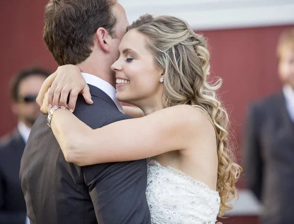 Loving newlyweds embracing — Stock Photo, Image