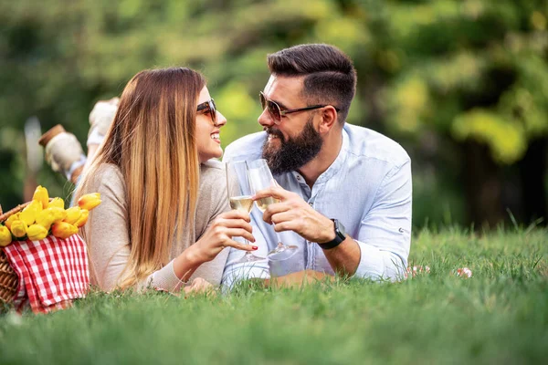 Happy couple in love at a picnic.People,love,vacation and lifestyle concept.