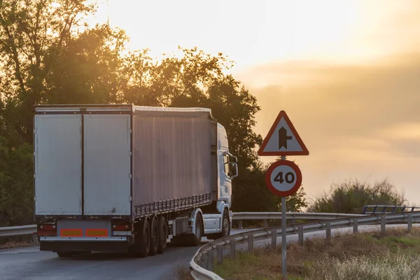 Truck Semi Trailer General Cargo Reaching Limited Speed Crossing Sunset — Stock Photo, Image