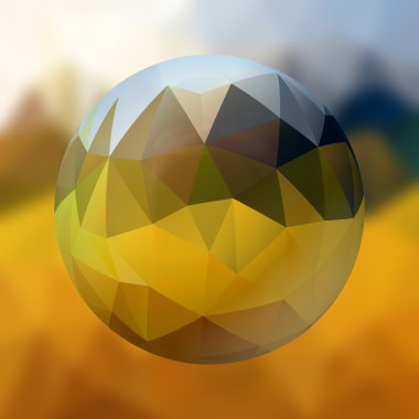 bulanık arka plan üzerinde çokgen desenli cam küre - sarı ve mavi renkli
