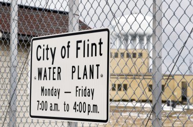 Flint Michigan Ocak 23, Flint 2016:City bitki su ve Flint'te, 23 Ocak 2016, Flint, Michigan işaret.