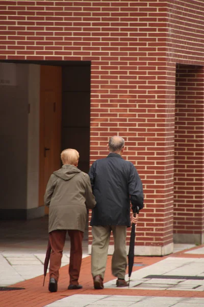 Ageing People Walking Street — Stock Photo, Image