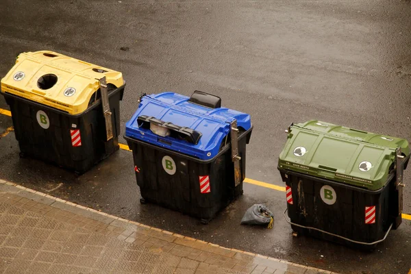 Different containers for recycling wastes