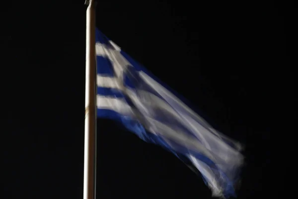 Greek flag waving in the air