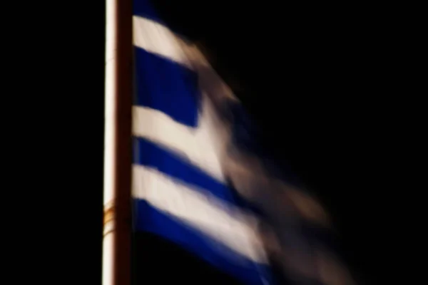 Greek flag waving in the air