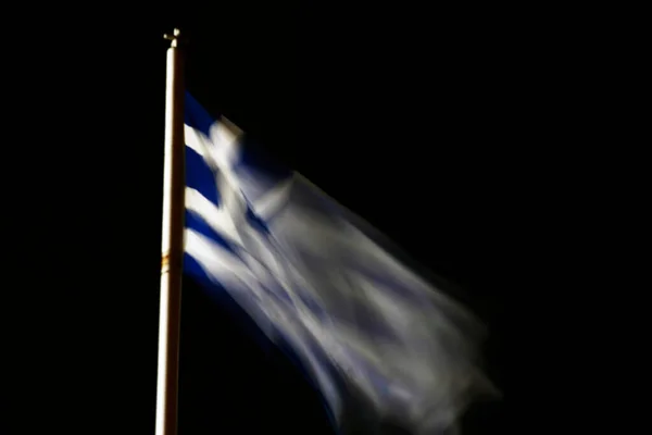 Greek flag waving in the air